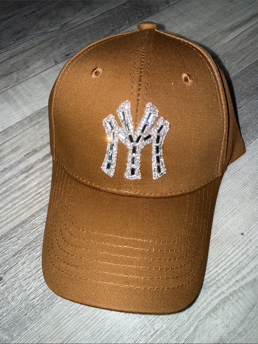 NWT .. Never worn Embellished Brown Baseball Cap with Rhinestone Logo